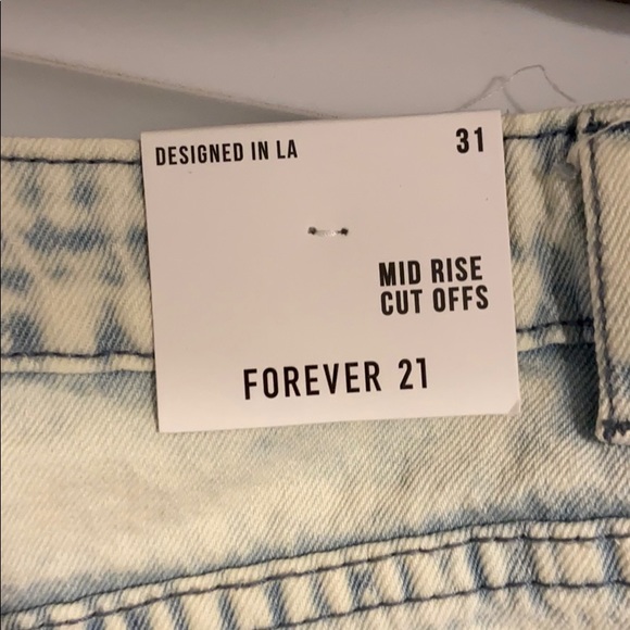 Light Denim Distressed Mid Rise Jean shorts - Picture 6 of 6